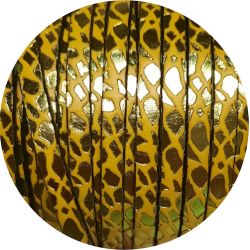Cuir plat 5mm fantaisie relief pistache métal sur fond jaune vif en vente au cm