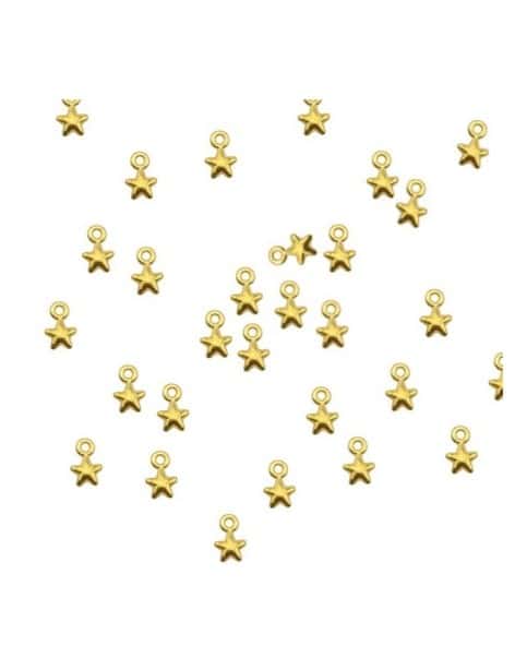Lot de 10 petites étoiles dorées bombées de 5mm