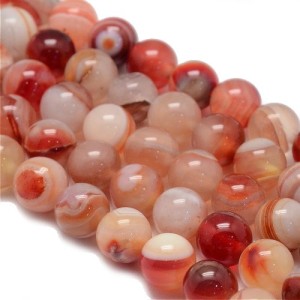 Fil de 62 perles rondes de 6mm en agate striées saumon rouge