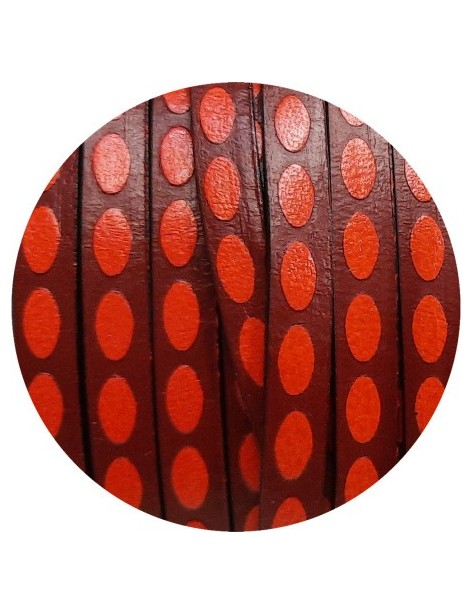 Cuir plat 5mm fantaisie ovales rouges sur fond bordeaux en vente au cm